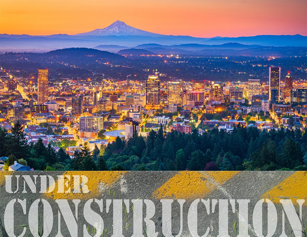 Oregon Contractors License Bonds - Picture of Seattle at sunset. Under construction sign under the city